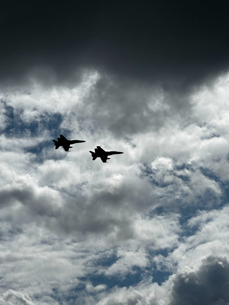 Two jets breaking through clouds